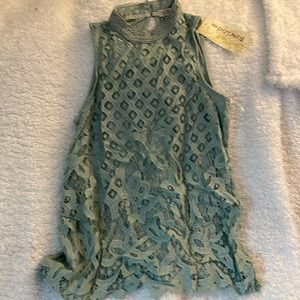 Green sleeveless shirt